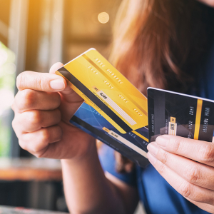 Closeup of a woman selecting a credit card